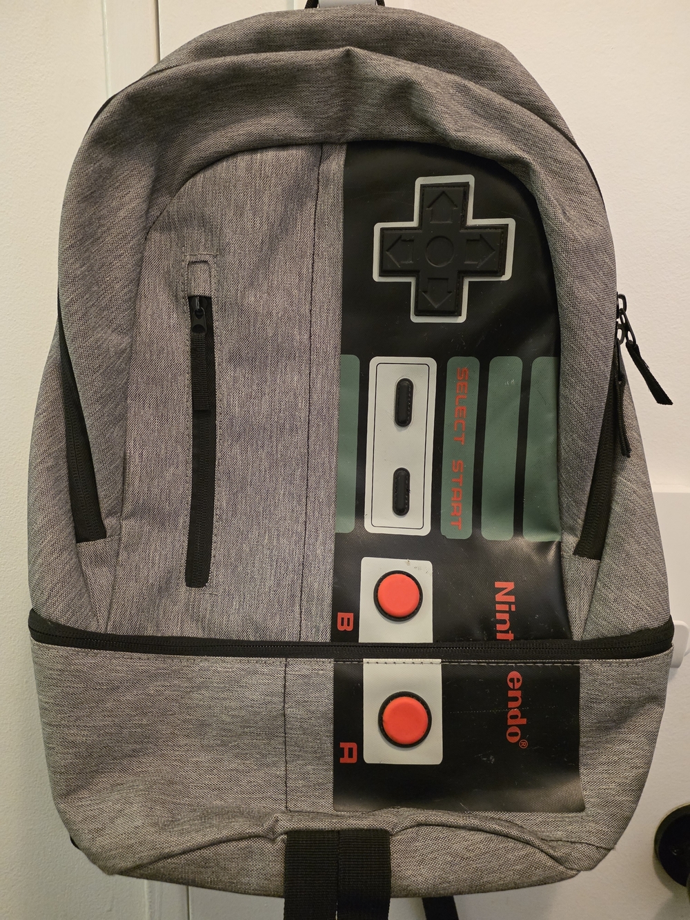 Nintendo Gray Retro Controller Graphic Backpack with Red Accents